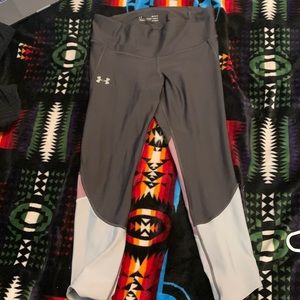 Underarmour capri tights, worn only a few times, very small hole pictured